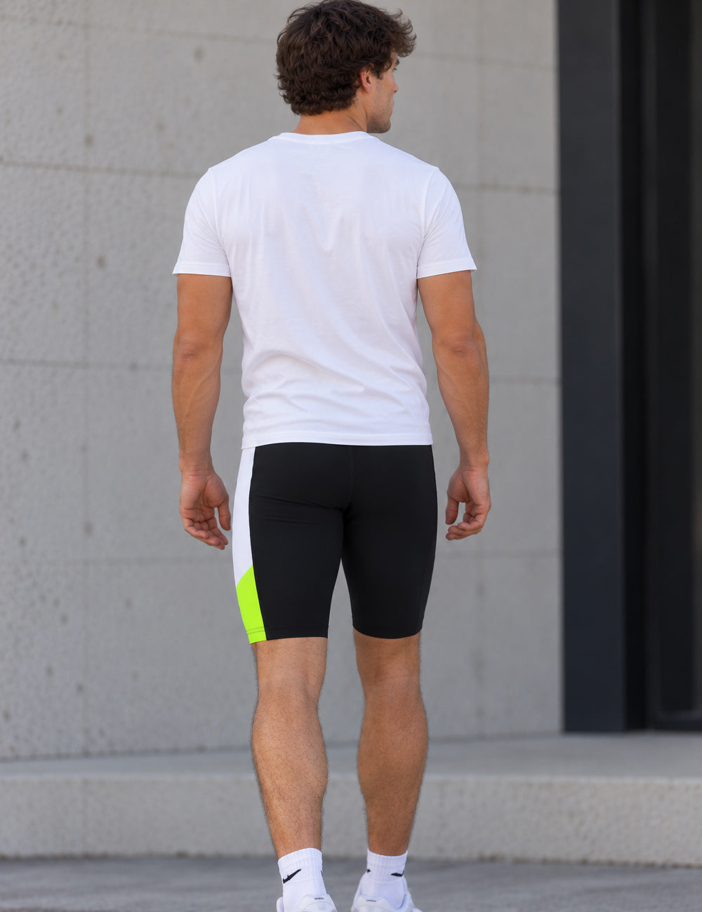 Pantalones de carrera para hombres neón negro corto